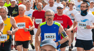 Example of Amazon Rekognition Custom Labels highlighting the number displayed on runners' bibs